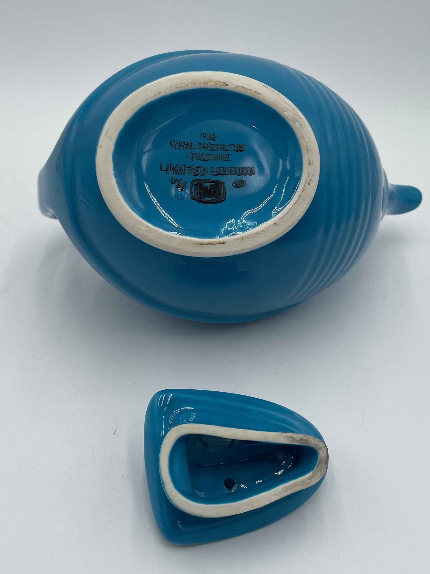 Hall China Specialties 1992 Peacock Blue Football Teapot
LIMITED EDITION