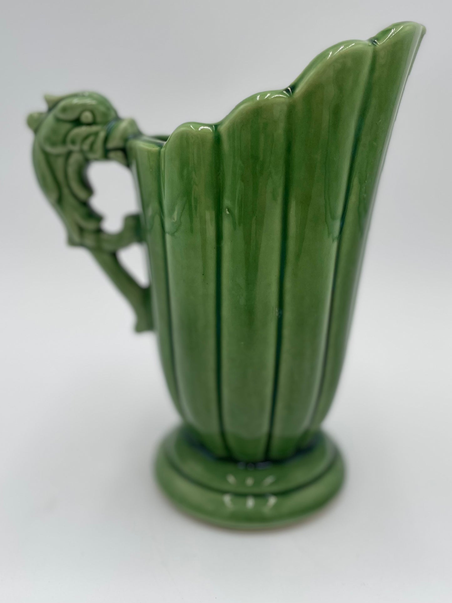 Vintage SHAWNEE Pottery Fluted Green Glazed Pitcher Vase with
Dolphin/Fish Handle USA - Vintosh Vintage