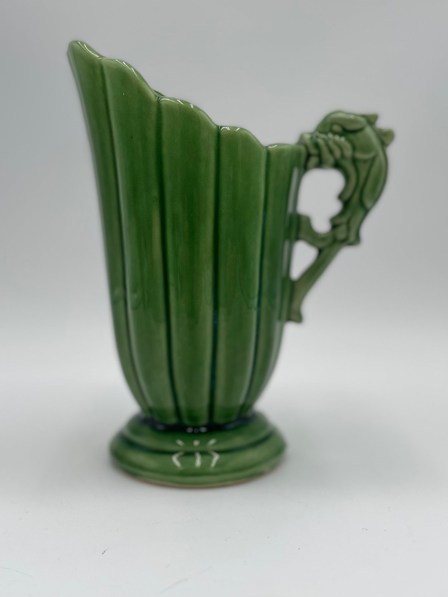 Vintage SHAWNEE Pottery Fluted Green Glazed Pitcher Vase with
Dolphin/Fish Handle USA - Vintosh Vintage